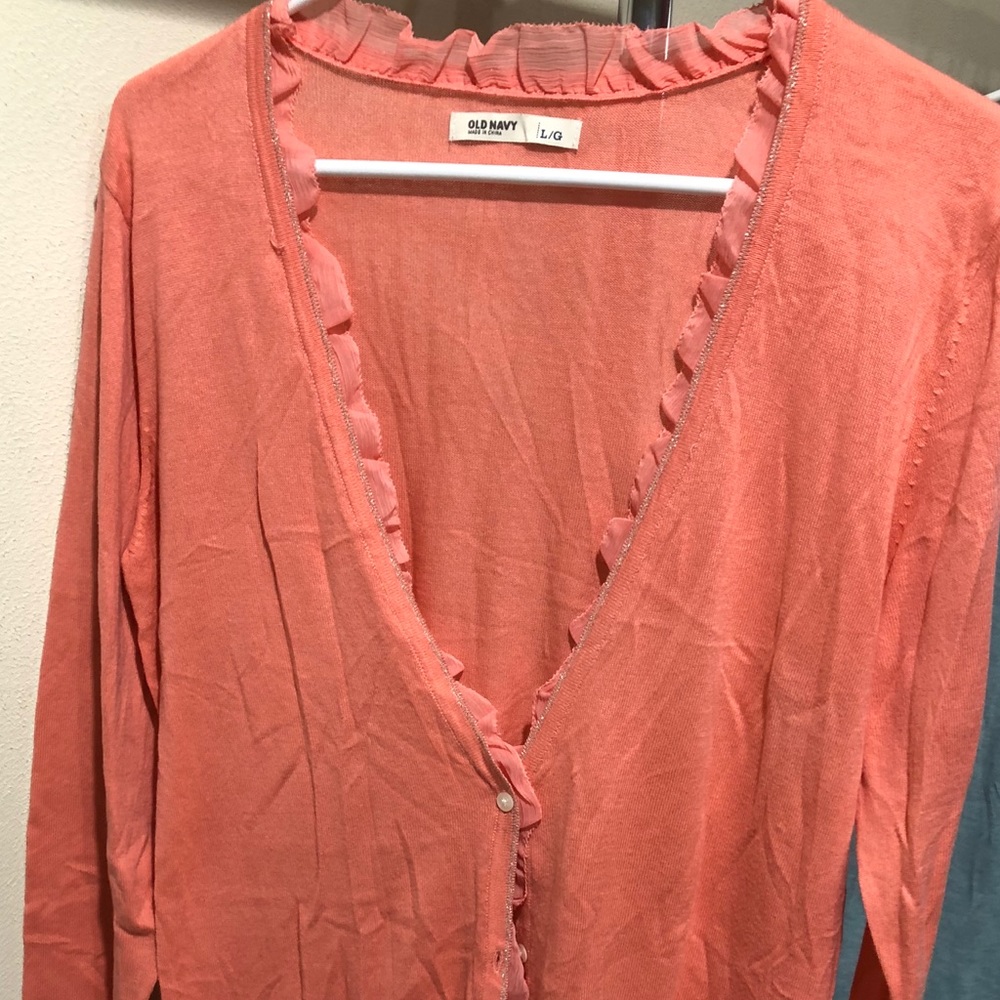 Boyfriend cardigan. Sheer trim dresses it up.